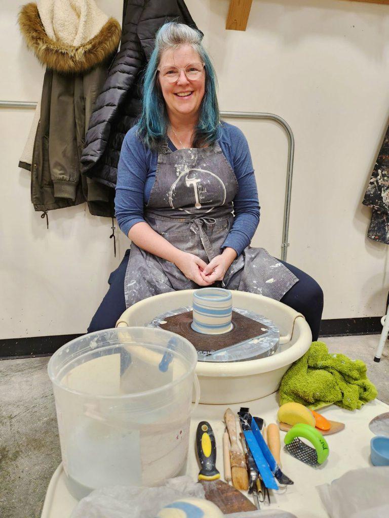 Anne Alftine Doing Pottery